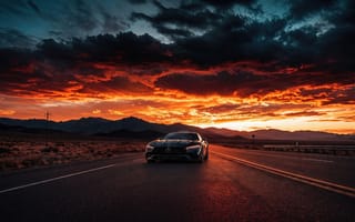 Картинка автомобиль, машина, шторм, рабочий стол, отражение, суперкар, нейросеть, рендеринг, холмы, трасса, тучи, 16:9, Mercedes-Benz, разметка, горы, багровое небо, скорость, закат, рассвет, радиатор, спорткар, HD, пейзаж, лучи, золотой час, путешествие, пустыня