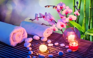 Картинка массаж сердца со свечами, орхидеями, полотенцами и бамбуком