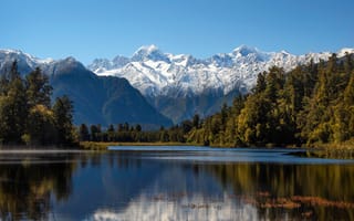 Картинка небо, горы, Lake Matheson, Новая Зеландия, New Zealand, деревья, Мэтисон, солнце, озеро