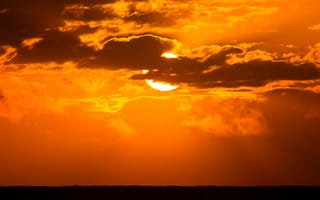 Картинка Солнце в облаках на закате