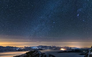 Обои Звездное небо над горами зимой
