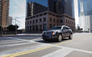 Картинка srx, авто, разметка, cadillac, улица, город, небоскрёб, машина