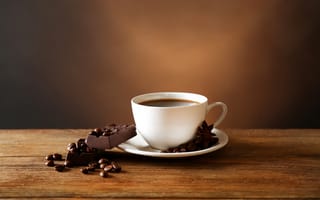 Картинка Кофе в белой чашке с черным шоколадом
