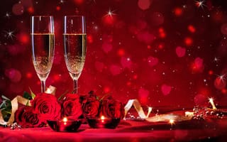 Картинка Букет роз и два фужера шампанского с зажженными свечами на красном фоне
