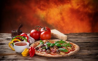 Обои Пицца с колбасой и грибами на столе с соусом и овощами
