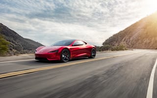 Картинка Красный автомобиль Tesla Roadster едет по трассе