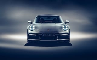 Картинка Серебристый Porsche 911 Turbo S 2020 года вид спереди
