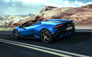 Картинка Быстрый синий автомобиль Lamborghini Huracan EVO RWD Spyder 2020 года на фоне скал