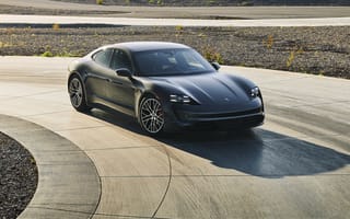 Картинка Черный автомобиль Porsche Taycan, 2020 года на дороге