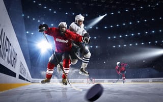 Картинка Мужчины играют в хоккей на льду