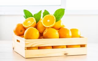 Картинка Деревянный ящик спелых сочных апельсинов