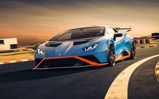 Обои Автомобиль Lamborghini Huracán STO 2021 года на трассе