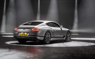 Картинка Автомобиль Bentley Continental GT Speed 2021 года вид сзади на сером фоне
