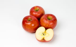 Картинка Спелые красные яблоки на сером фоне