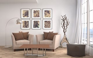 Картинка Два кресла с вазой стоят в комнате с большим окном