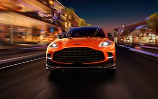 Картинка Aston Martin, Астон Мартин, спорткар, машины, машина, тачки, авто, автомобиль, транспорт, скорость, быстрый, дорога, город, здания, оранжевый, ночь, огни, подсветка