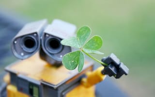 Картинка Робот Валли подает зеленый росток