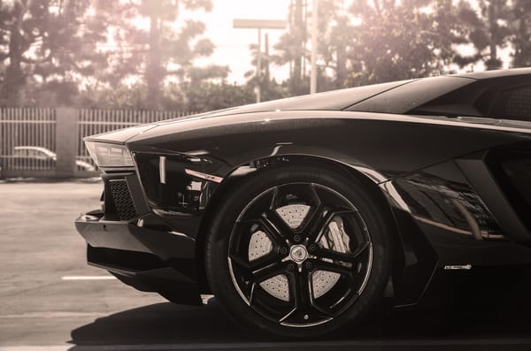 Обои Lamborghini, black, back, lp700-4, черный, ламборгини, rim, авентадор, aventador, диск, sun, колесо, солнце