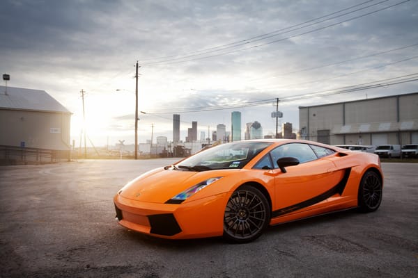 Обои Lamborghini, orange, Gallardo, ламборгини, галлардо, блик, город, оранжевый, ламборджини, солнце, небо