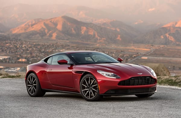 Обои Aston Martin, город, суперкар, дорога