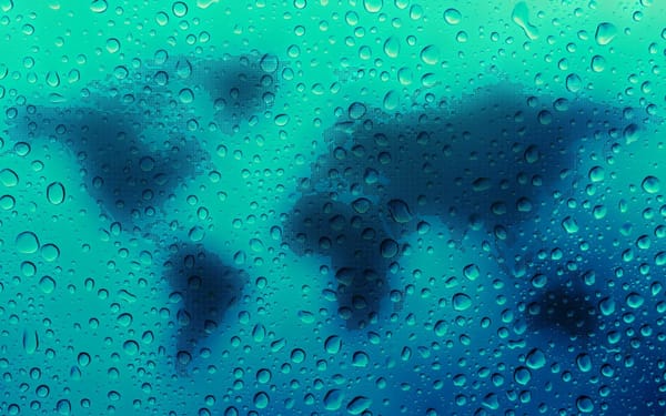 Обои Голубая карта мира в каплях воды