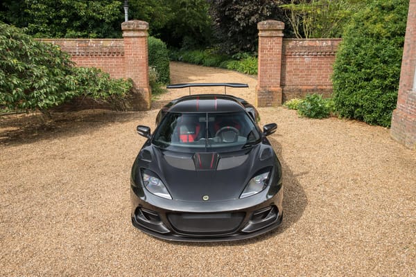 Обои Черный автомобиль Lotus Evora GT430 вид спереди