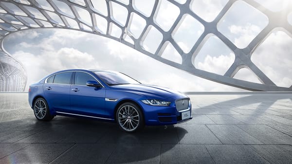 Обои Синий автомобиль Jaguar XEL,2018